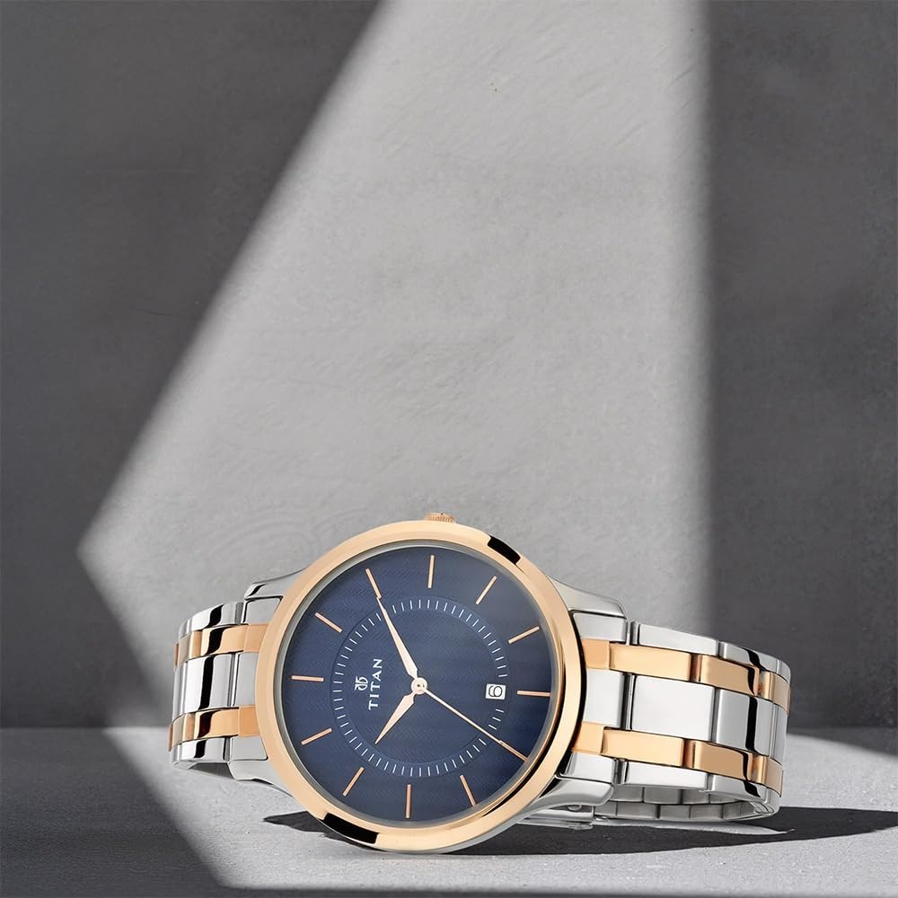 Titan 1825KM01 Mens Watch Rose Gold Mesh Strap Blue Crystal Dial 47mm