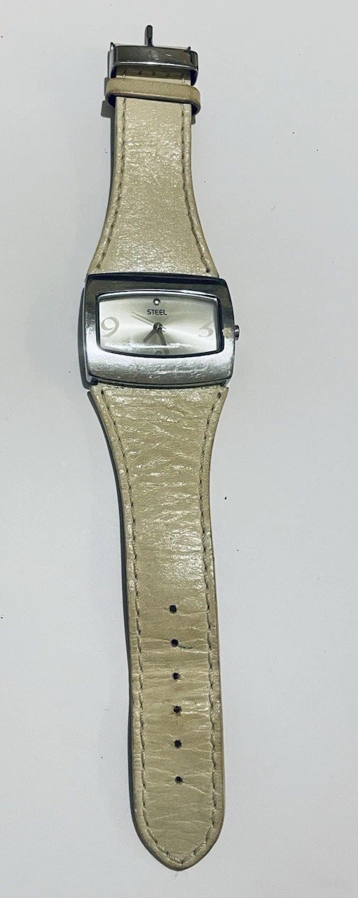 Woman’s STEEL watch with cream Leather strap. Good condition. Length 21cm