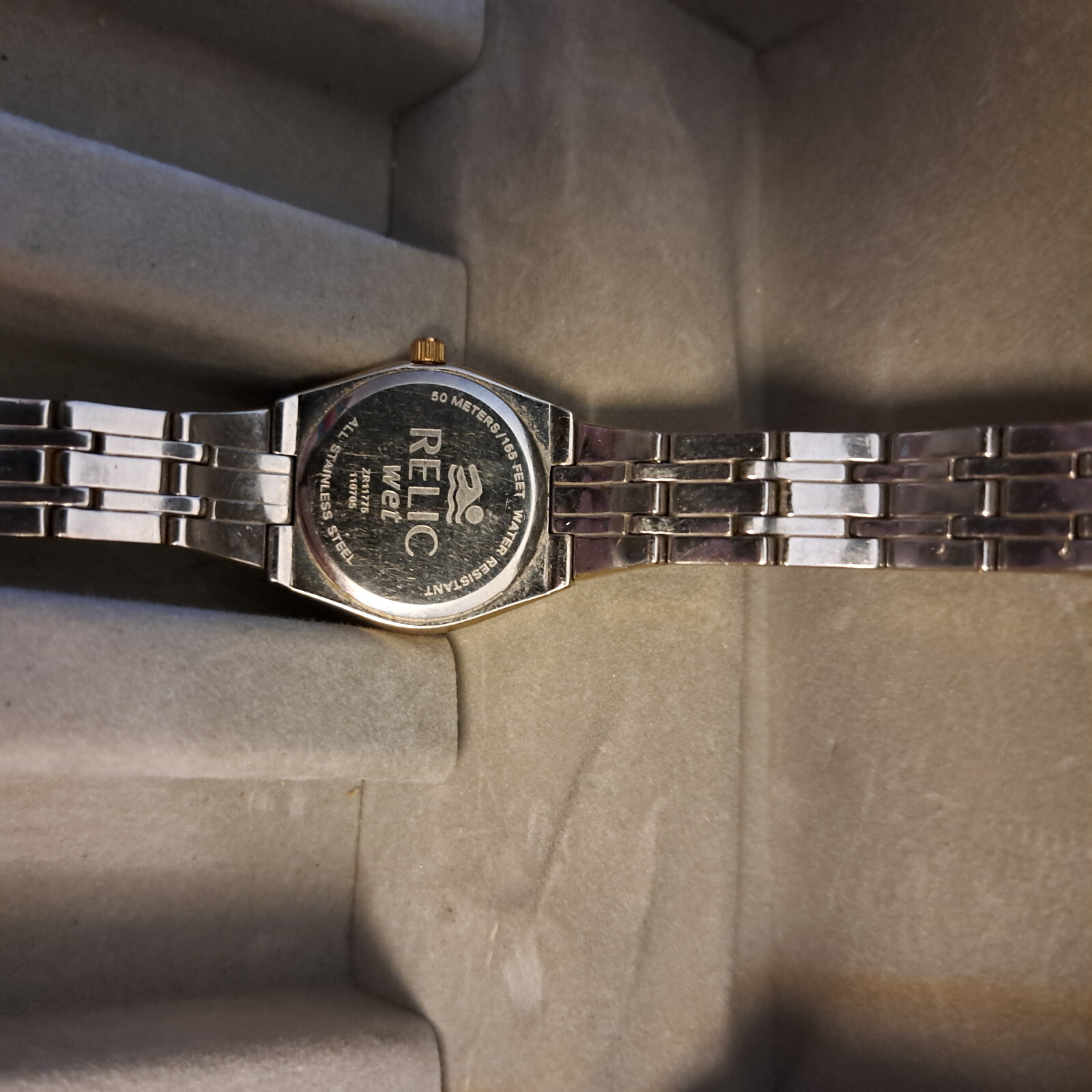 Relic PR6083 Gold Tone Wrist Watch for Women With Date And Black Leather Band