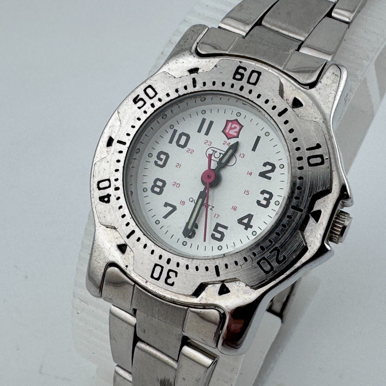 TUAI Japan Quartz Watch Women Silver Military Dial Fixed Bezel New Battery 7.25″