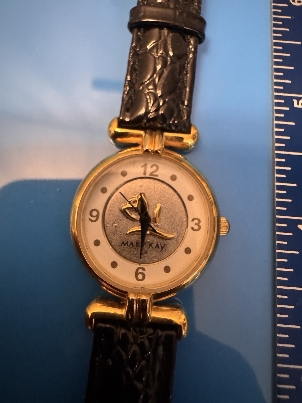 Mary Kay Women’s Quartz Dress Watch Gold Tone Case Black Leather Strap Arabic
