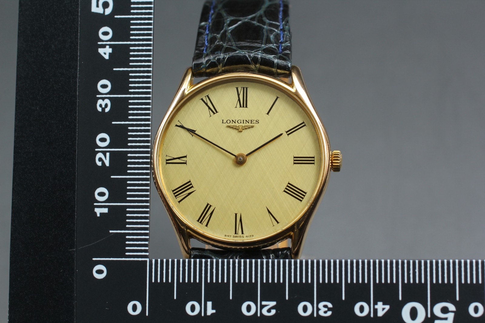 Near MINT Longines L847.4 Gold Roman Dial 33mm Hand Winding Men’s Watch w/ Box