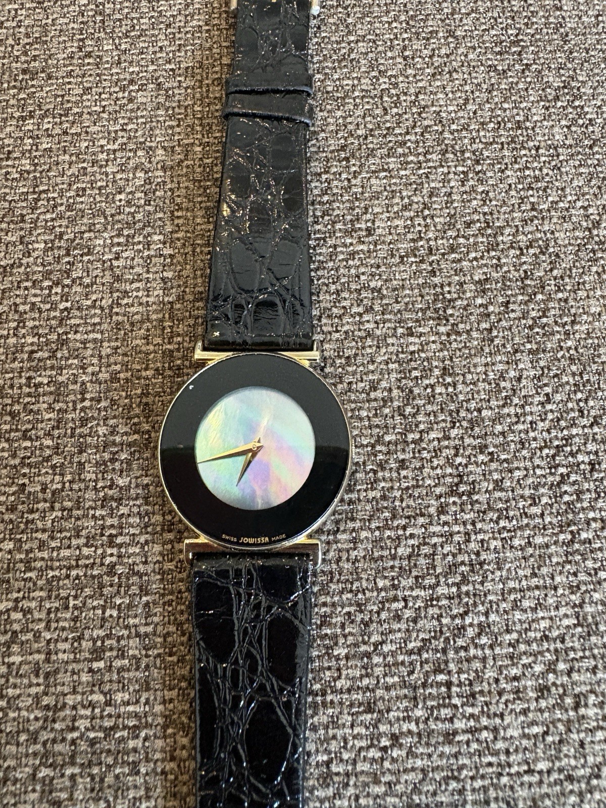 Movado women’s watch. Mother Of Pearl Face. Black Leather Strap