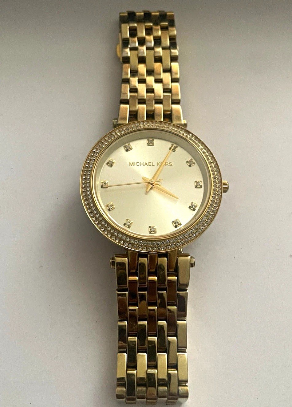 Michael Kors Darci Women’s Gold Analog Quartz Gem-Set Bezel Bracelet Watch