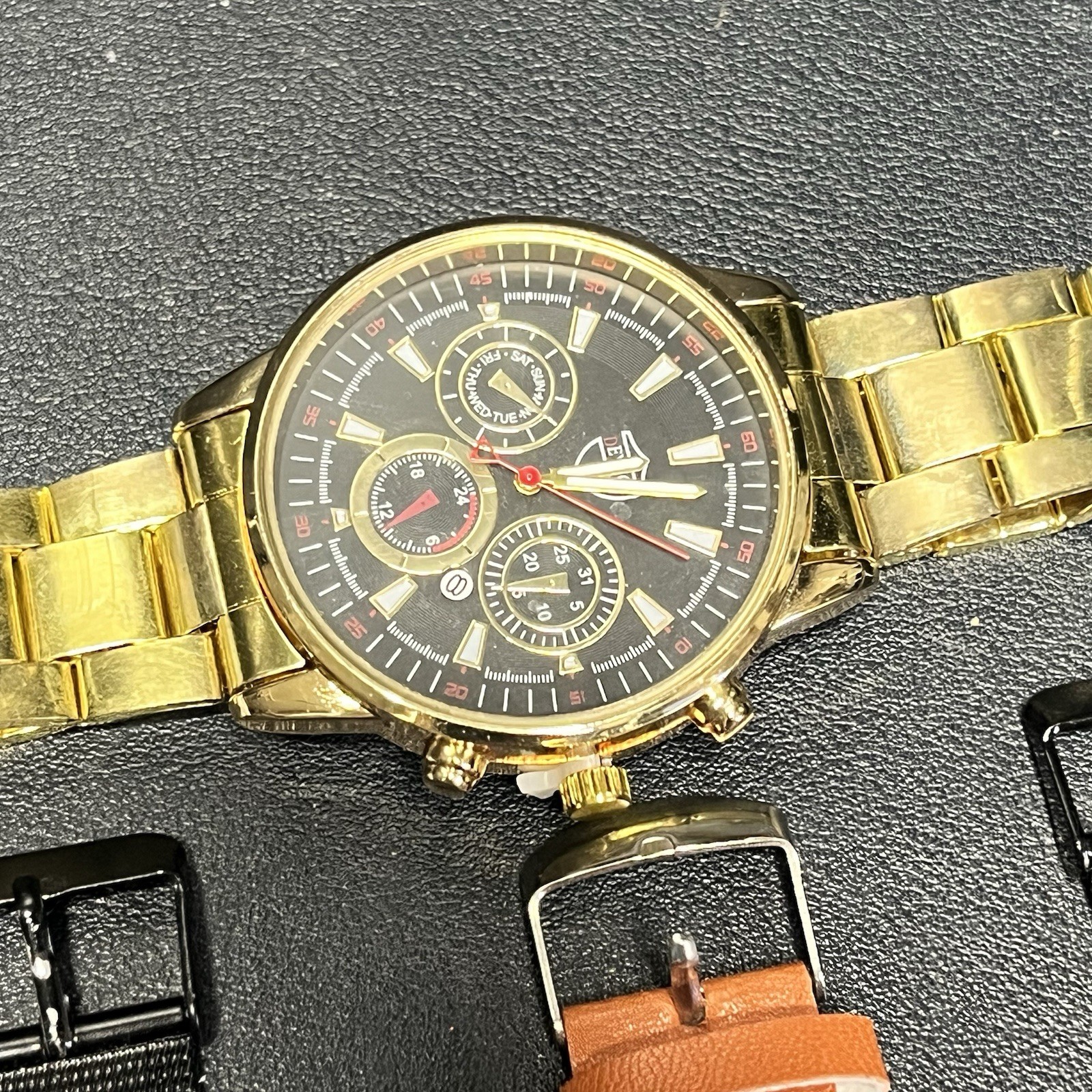 Men’s Wrist Watch Lot Of 8, Deyros Geneva PX, Black Gold Brown Tones Untested.