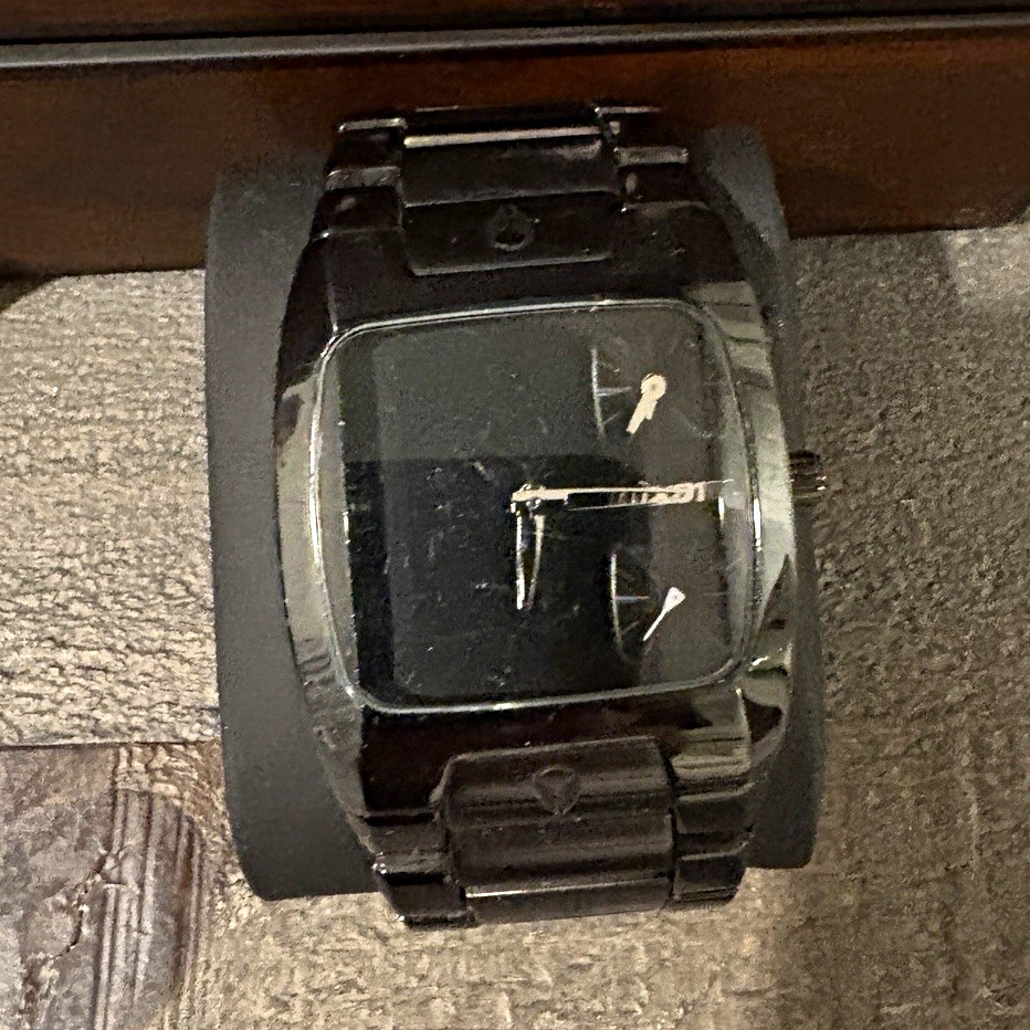 Nixon Black Watch. Band wear needs battery.