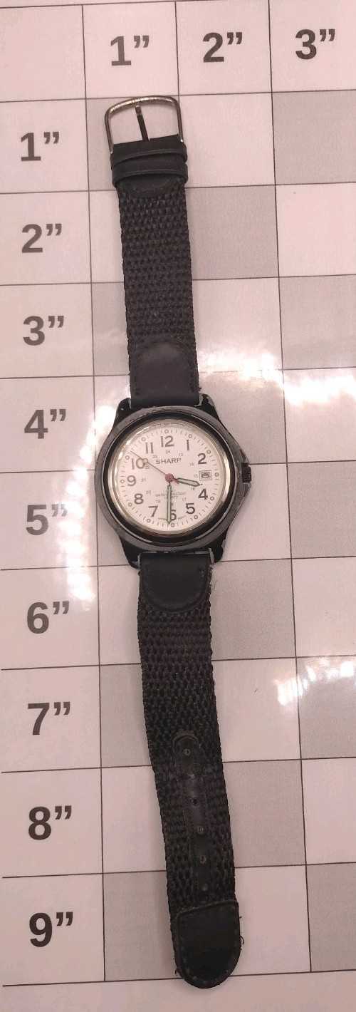 Sharp SHP-1607 Water Resistant to 100 feet Wristwatch. Needs battery.