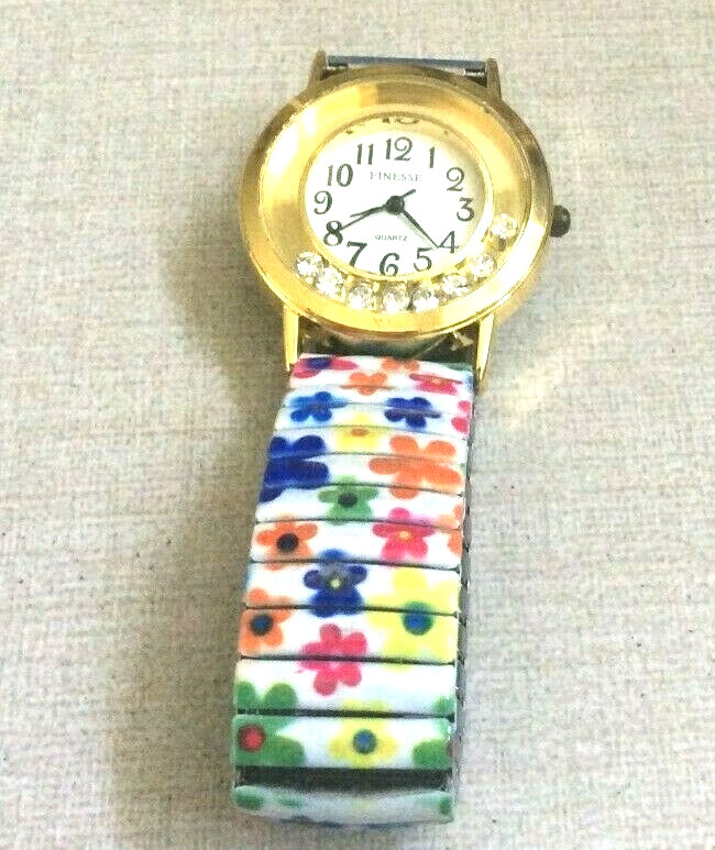 Finesse Women’ Gold Watch Slide Crystal Bezel on Flowered White Stretch Band New