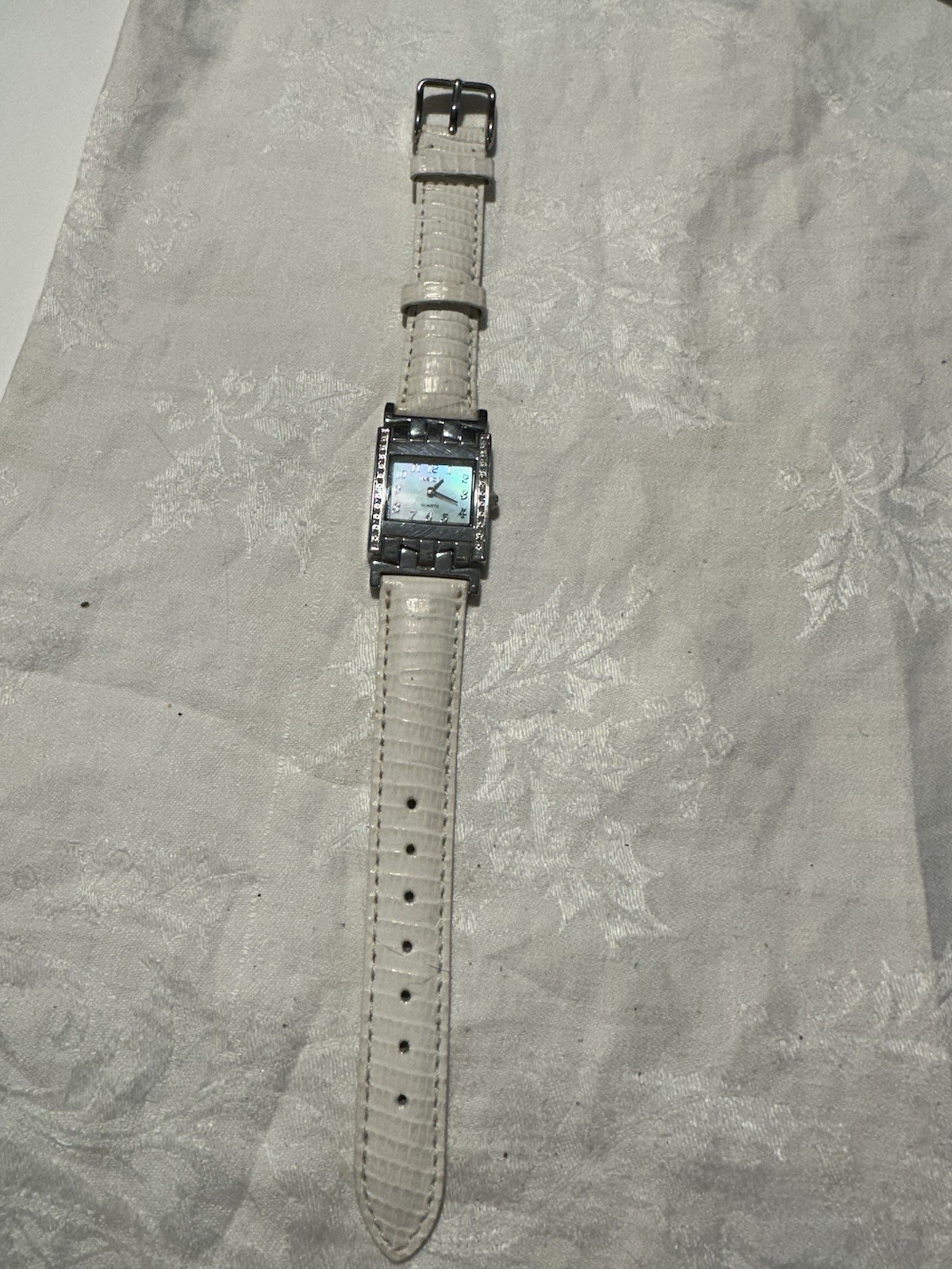 Invicta Women’s Quartz Watch With White Lizzard Band