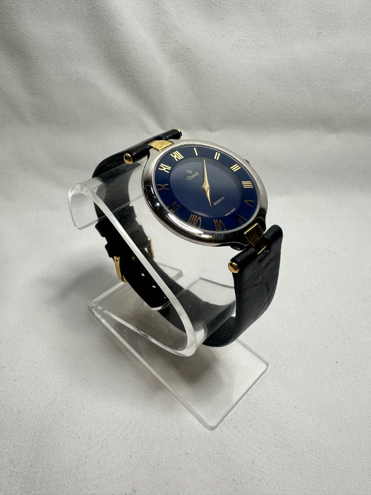 VINTAGE CHEVAL QUARTZ GOLD TONE CASE BLACK STRAP
