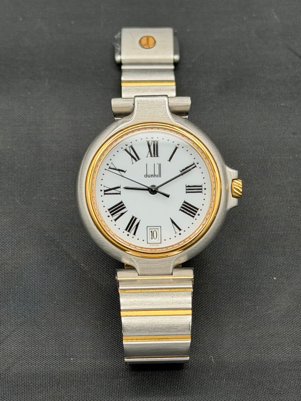Dunhill Millennium Two-Tone Stainless Steel Roman Watch. Swiss quartz movement.
