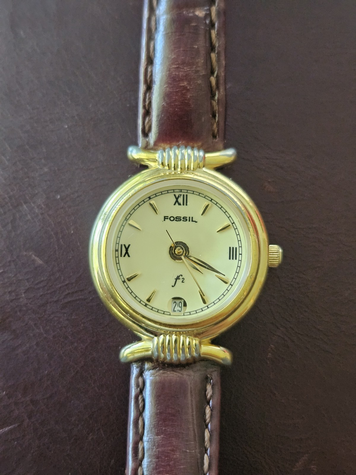 Fossil F2 Women’s Quartz Gold Tone Watch Brown Leather Band Date Roman Dial