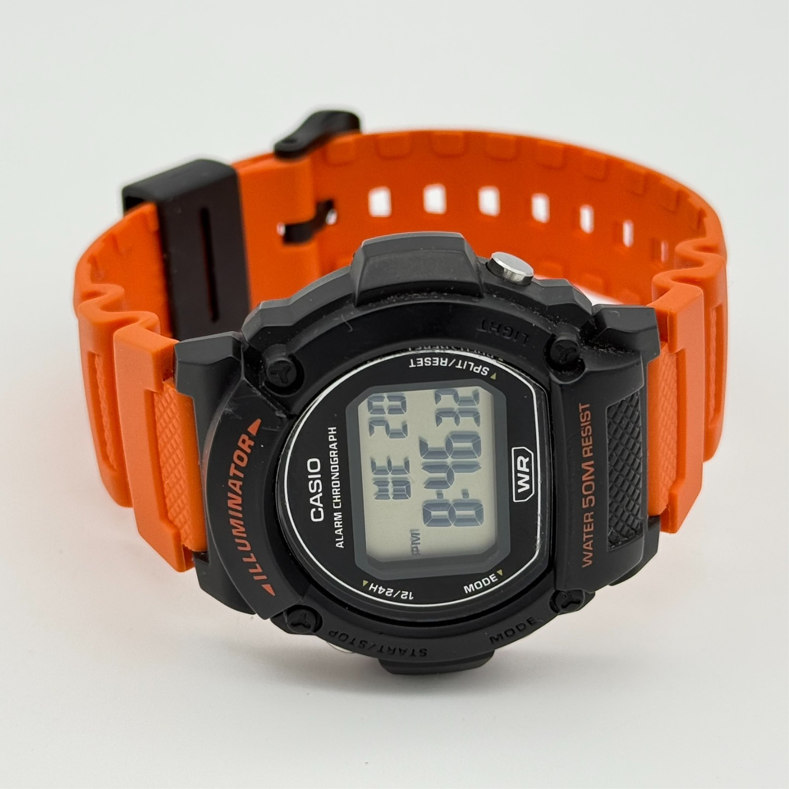 Men’s CASIO Digital Alarm Chronograph Watch, Black Case, Orange Band, W-219H-4AV