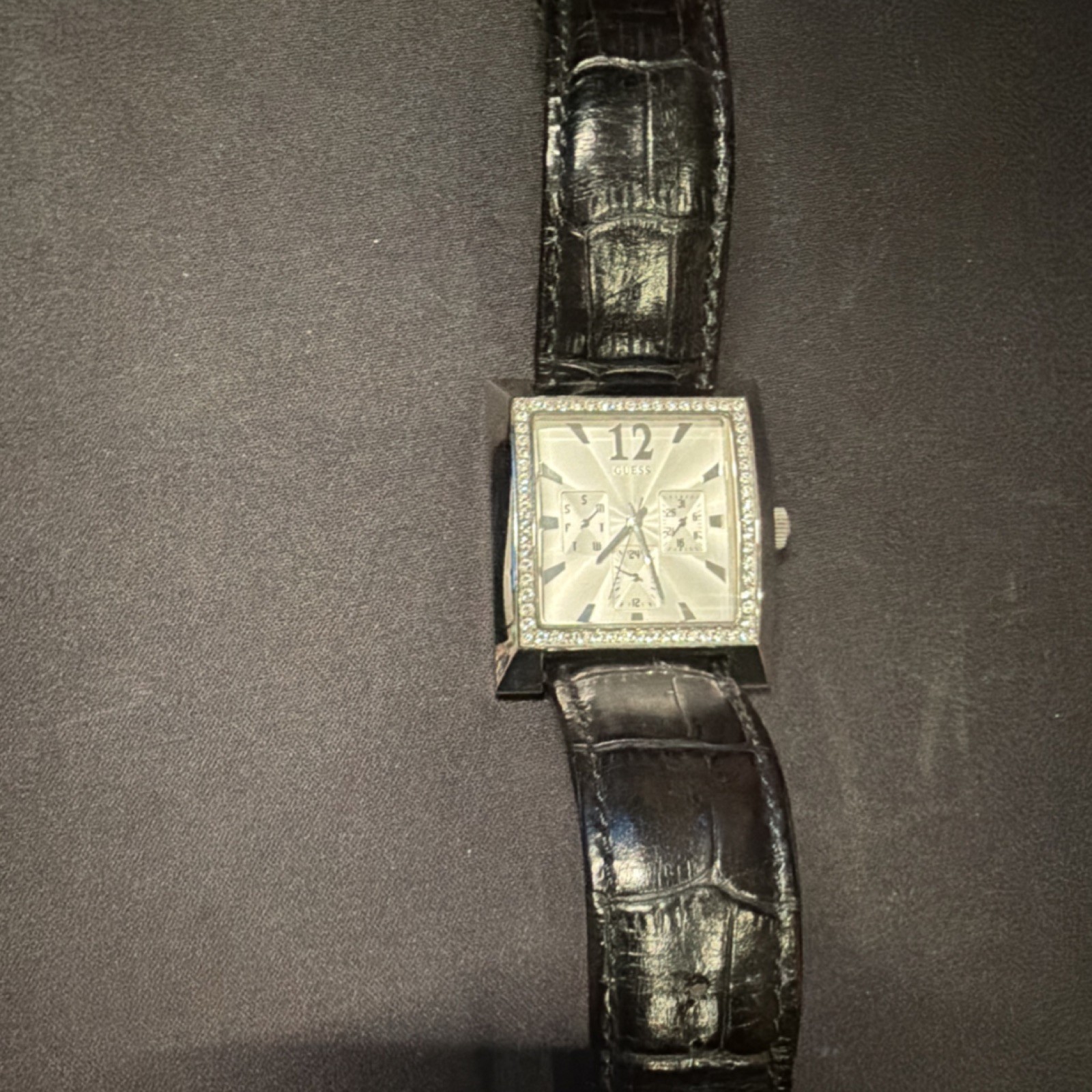 GUESS Timeless Beauty Women’s Quartz Square Silver Dial Black Leather Strap