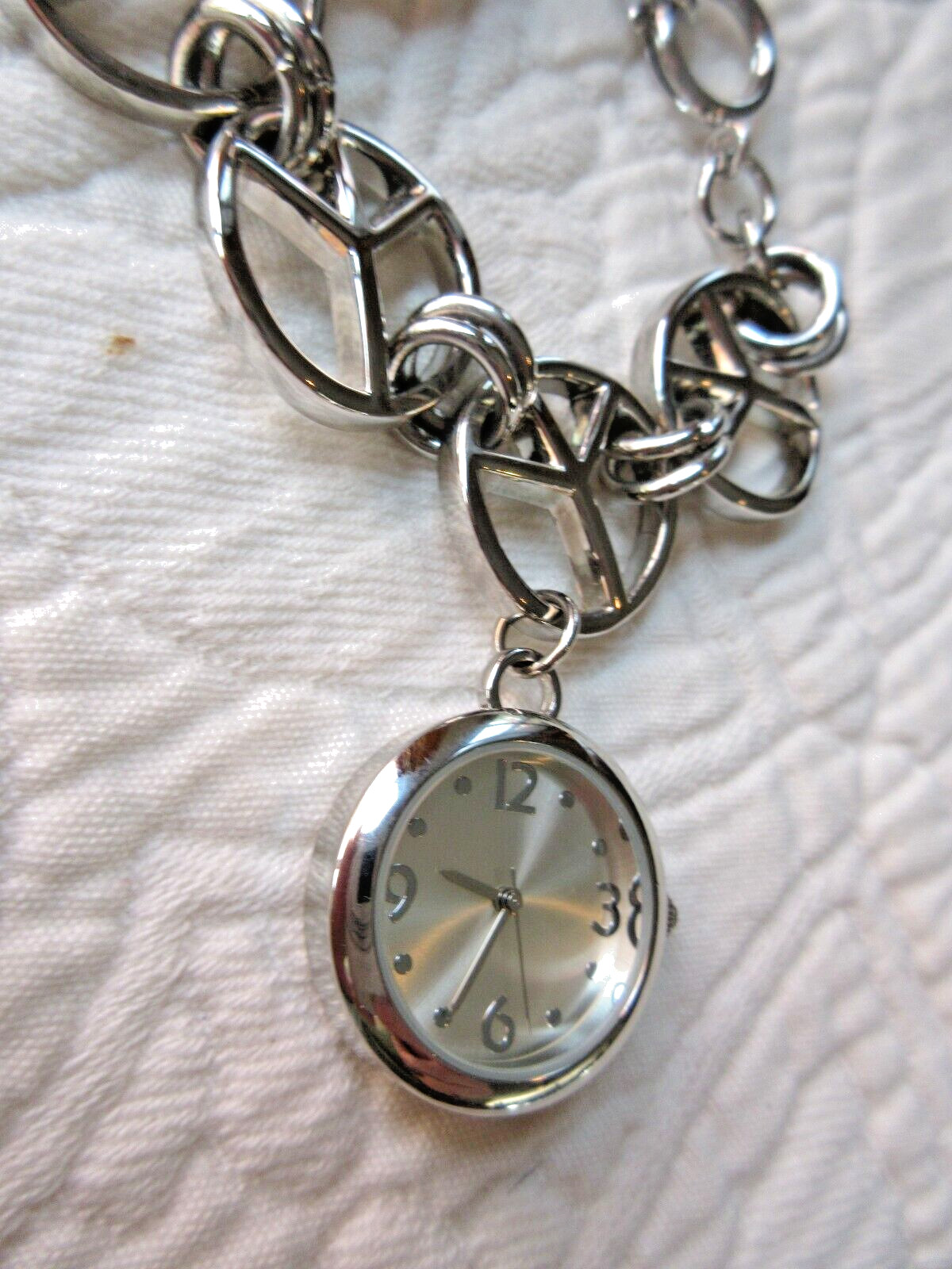 XHILARATION WRISTWATCH POLISHED CHROME PEACE SIGNS SECONDS HAND NEW BATTERY SS