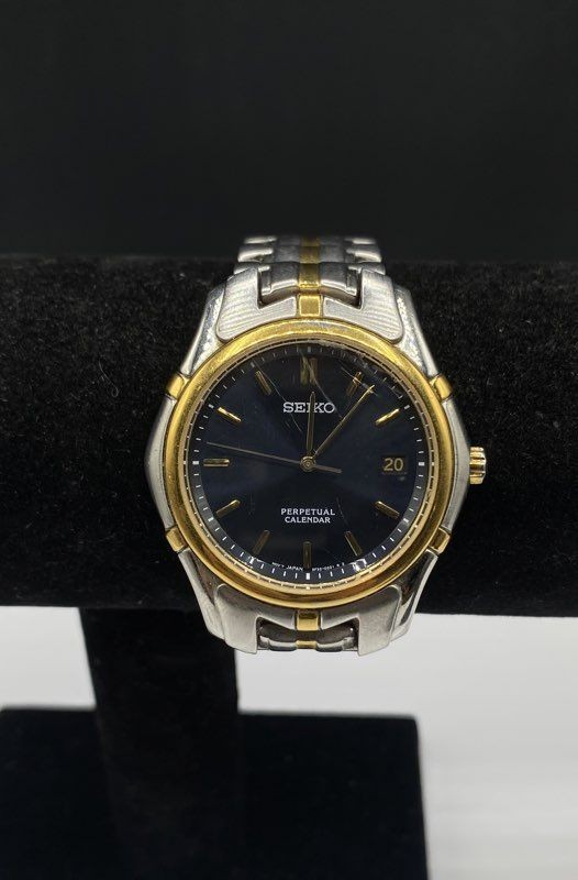 Seiko 8F32-0189 Perpetual Calendar Two Tone Men’s Watch Blue Dial 38mm