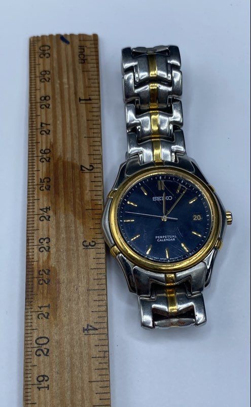 Seiko 8F32-0189 Perpetual Calendar Two Tone Men’s Watch Blue Dial 38mm