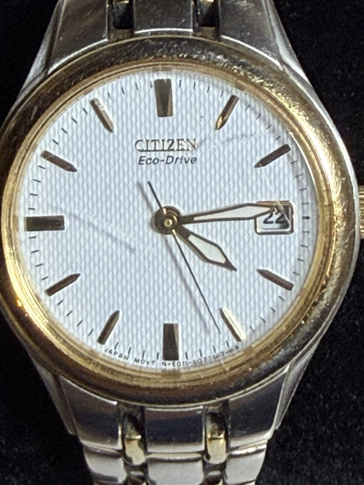 Citizen Eco-Drive E011-S049571 White Dial Date Silver Gold Tone Woman’s Watch