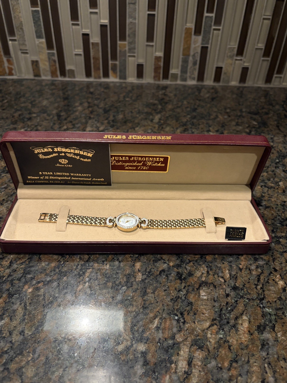 Jules Jurgensen mother of pearl women quartz watch with Austrian crystals
