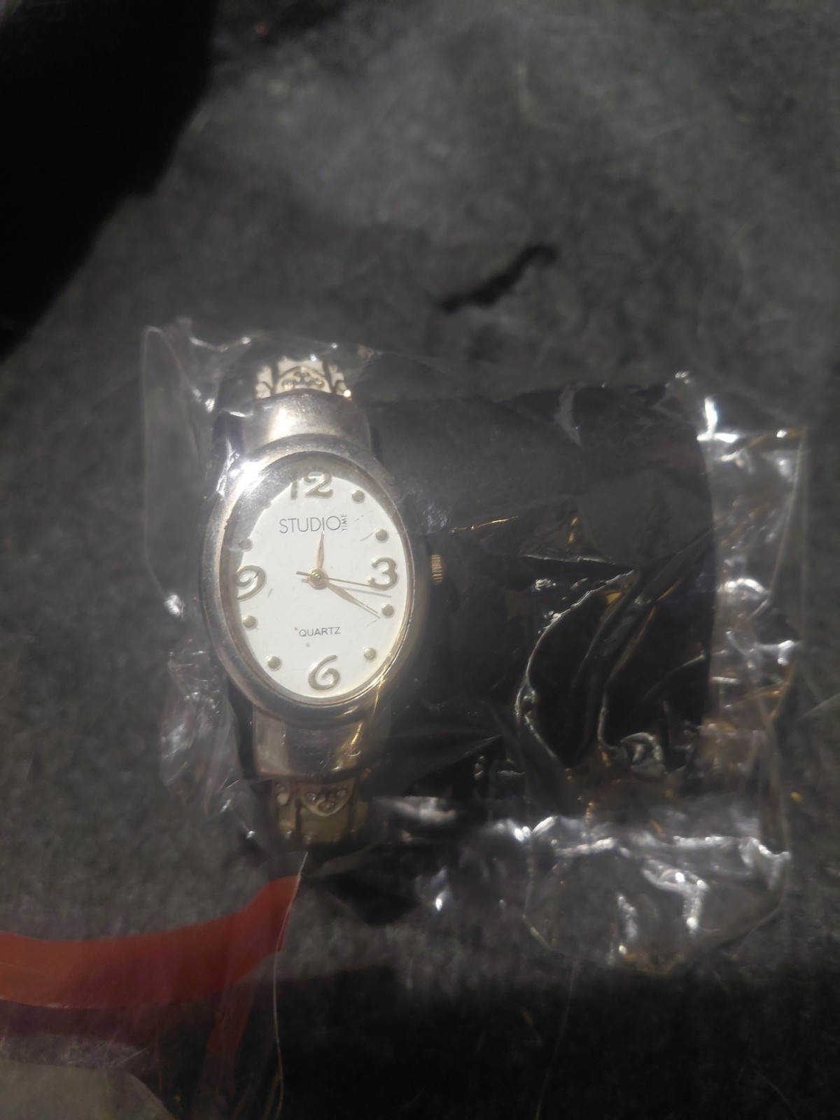 Studio Quartz Women’s Oval Wristwatch Silver Case White Dial Black Leather