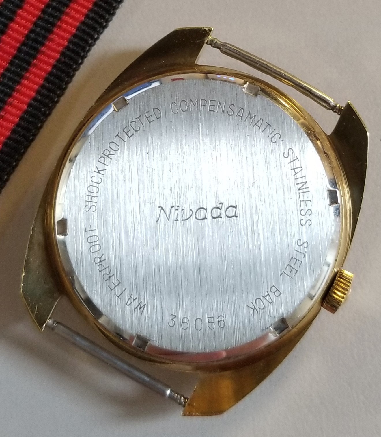 NIVADA COMPENSAMATIC 36058 SWISS NOS VINTAGE RARE 34 MM WIND UP MEN’S WATCH