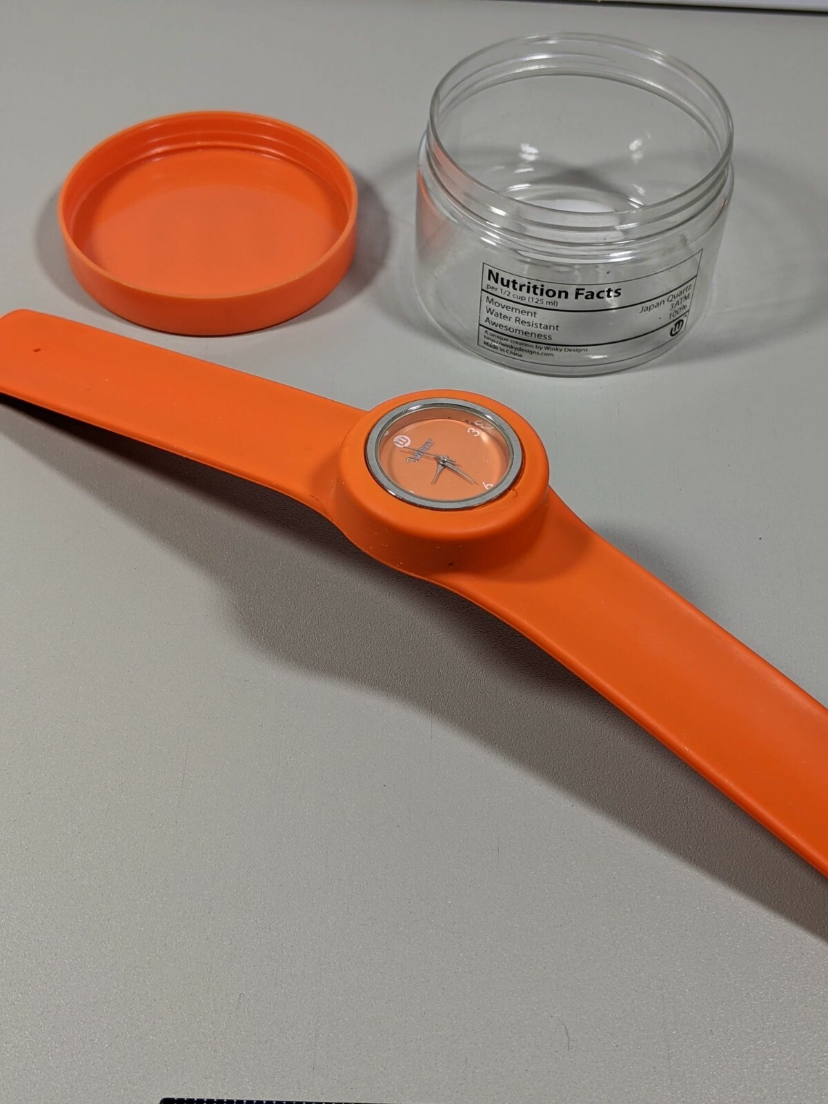 Winky Silver Tone Orange Dial Slap On Band Watch