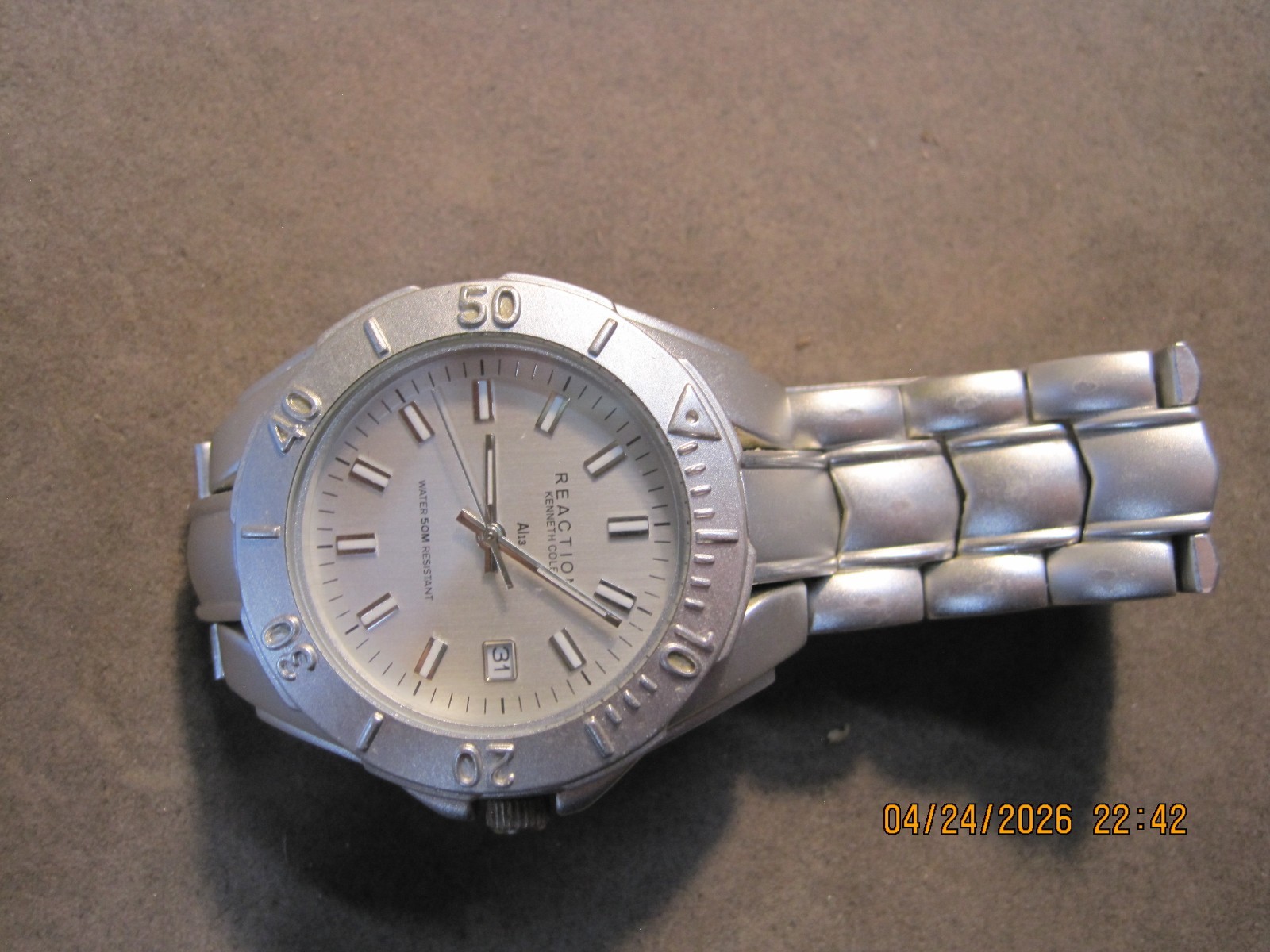 Kenneth Cole Reaction Men’s Silver Metal Wristwatch Analog Dress Stick Indexes