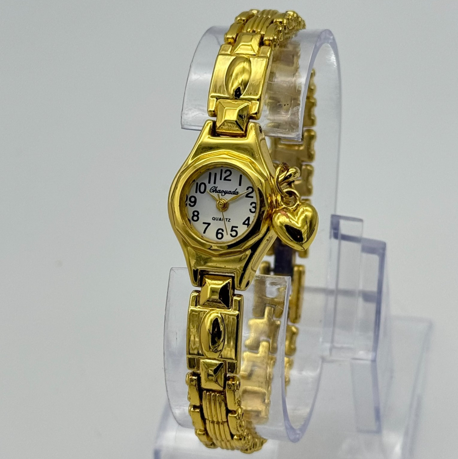 Women’s Gold Tone Classic Petite Bracelet Watch, White Dial, Runs, Heart Charm