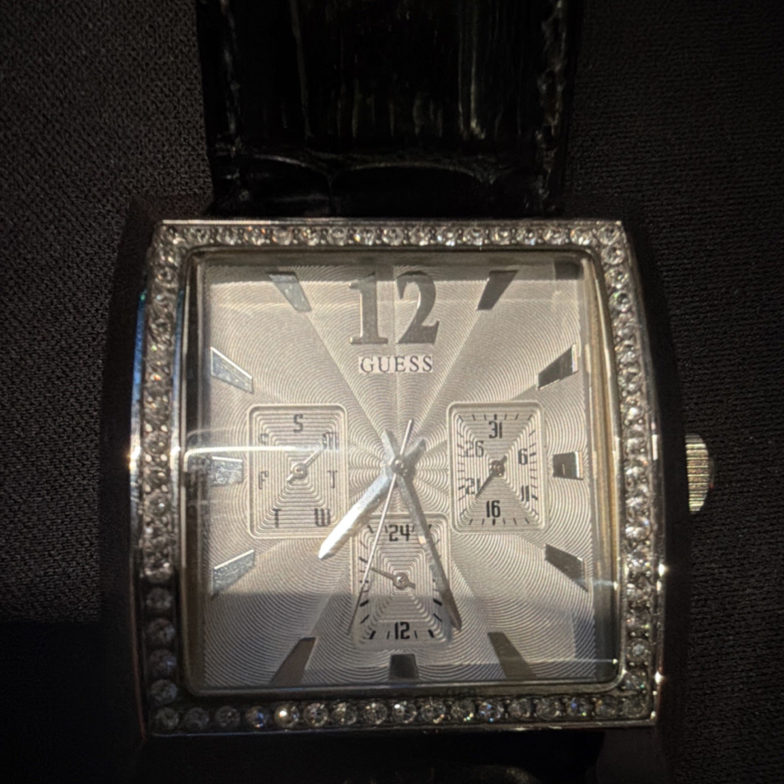 GUESS Timeless Beauty Women’s Quartz Square Silver Dial Black Leather Strap