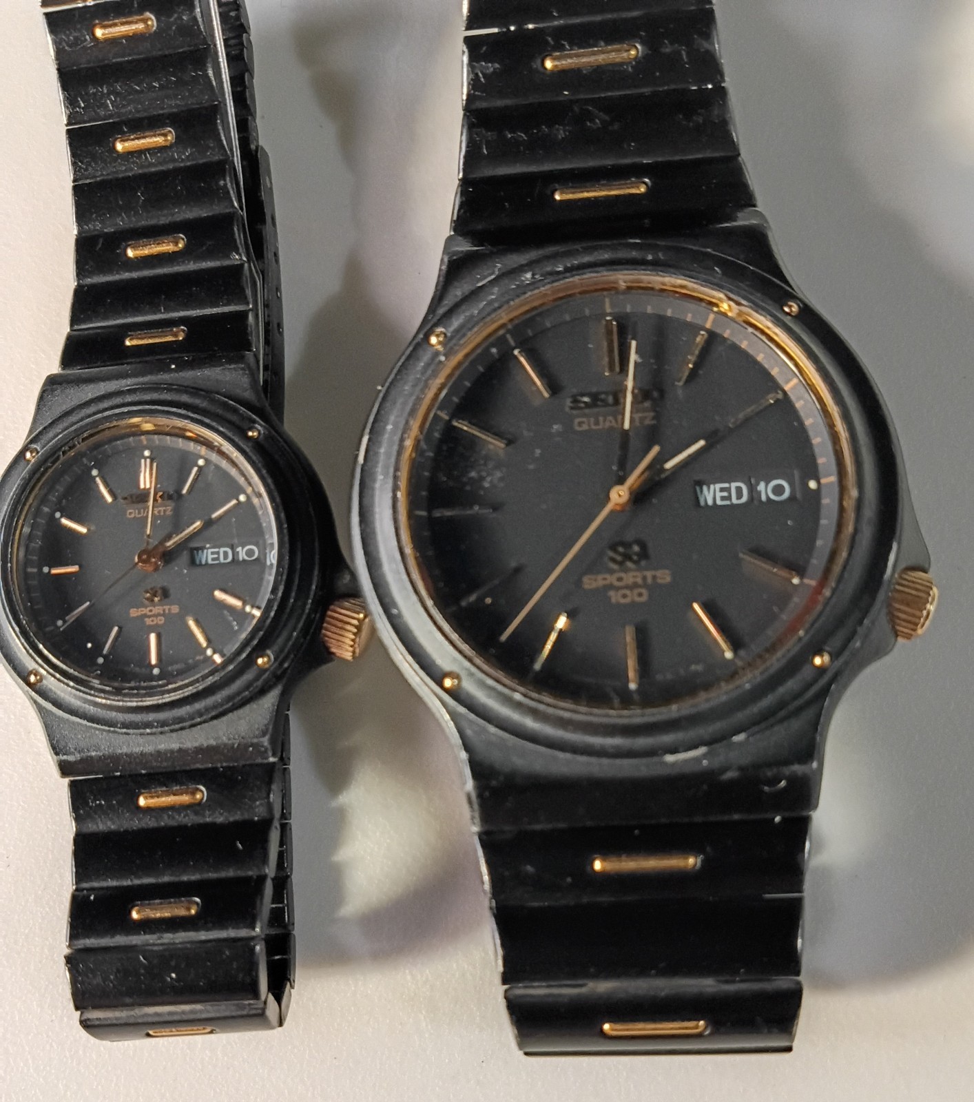 SEIKO SQ SPORTS 100 HIS HERS 1985 WATCH SET BLACK W/ GOLD ACCENTS RUNS GREAT