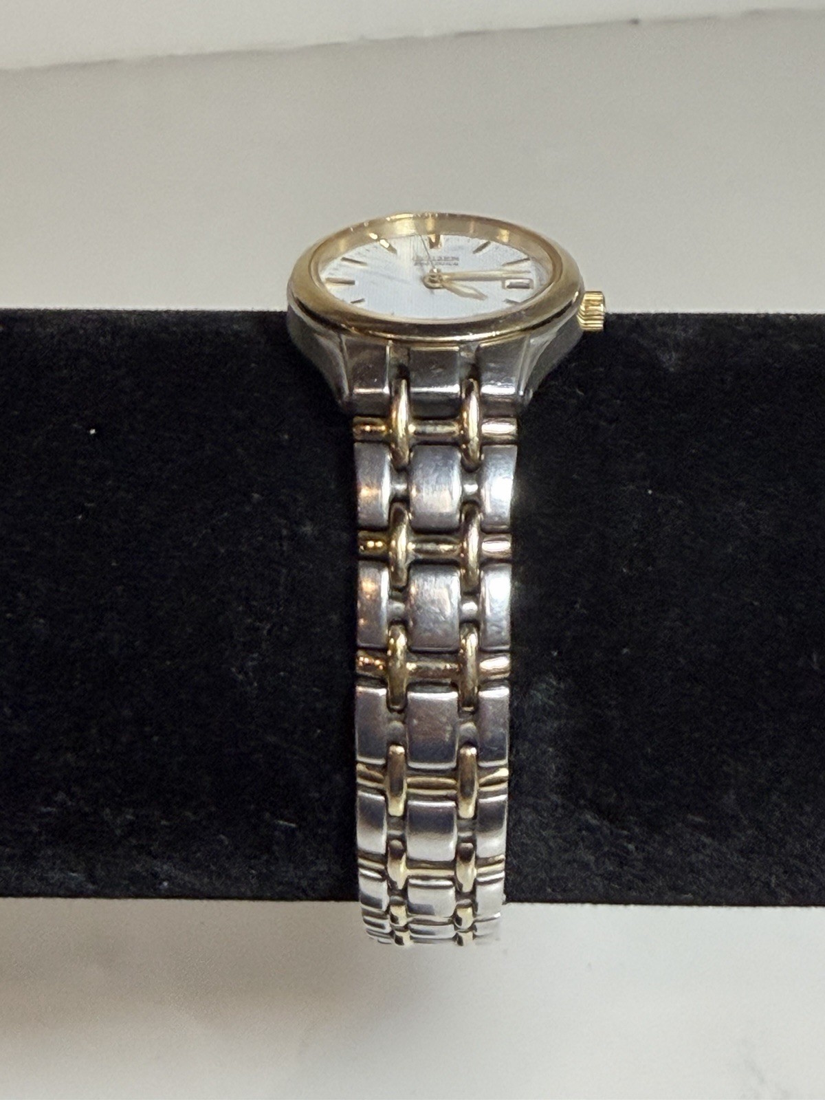 Citizen Eco-Drive E011-S049571 White Dial Date Silver Gold Tone Woman’s Watch