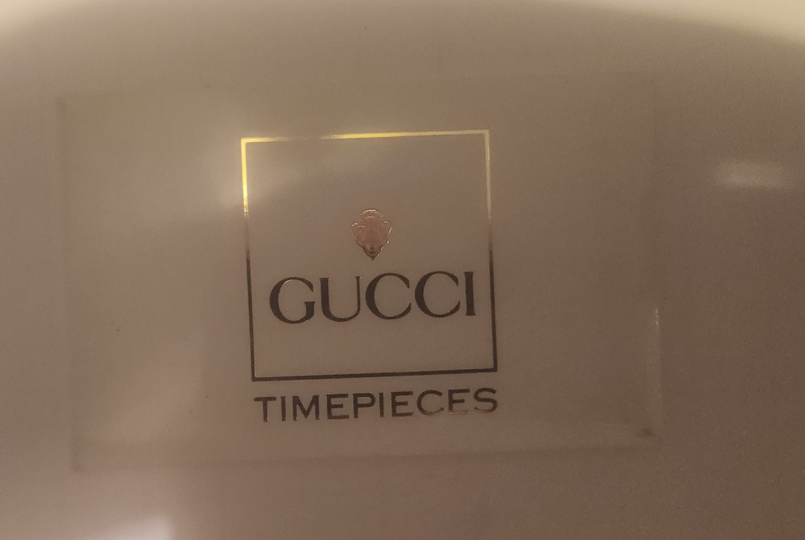 Gucci 1100 Series Interchangeable Bezel Watch (referred to as the Gucci 11/12)