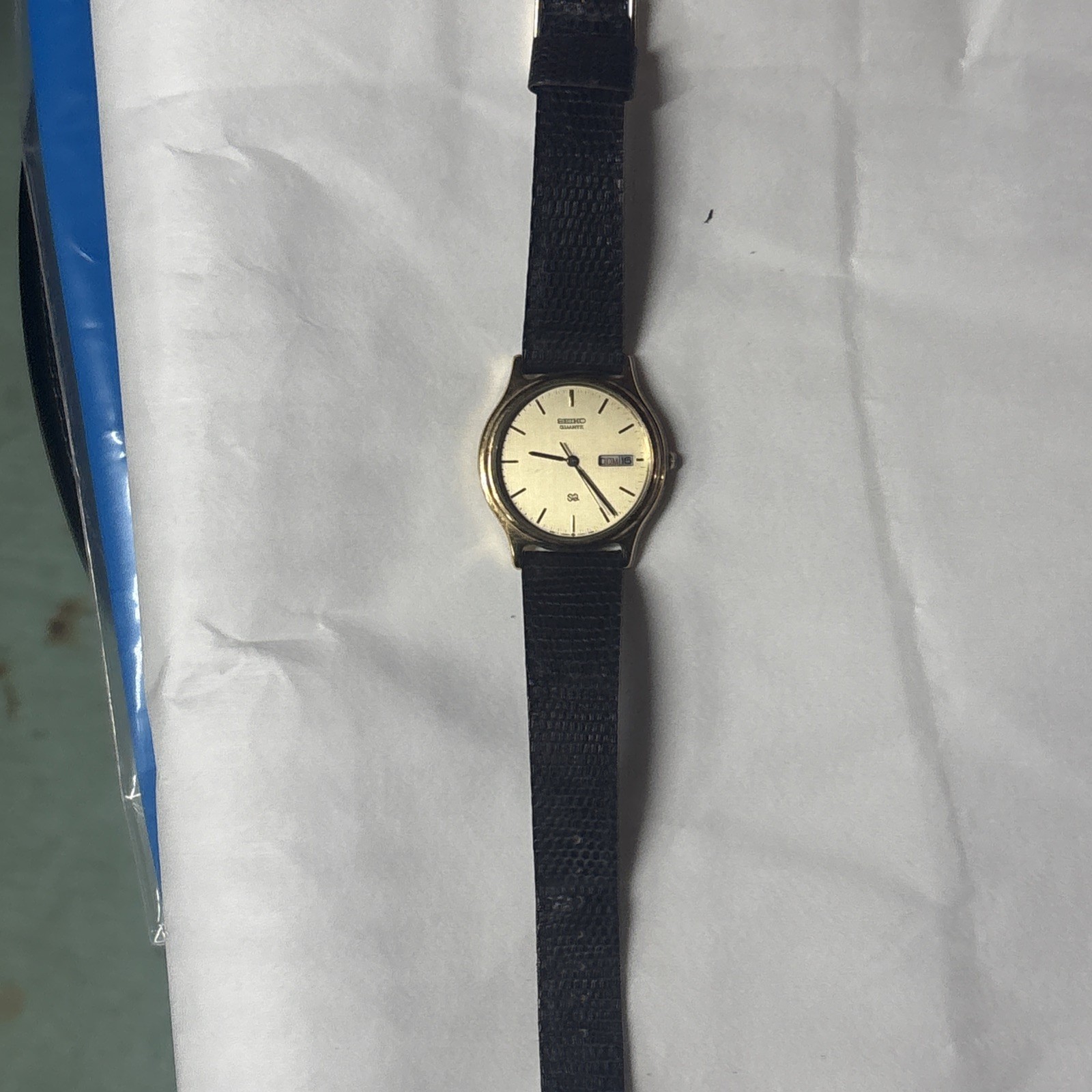 Seiko SQ Quartz 8C23-6010 — Champagne Day/Date, Gold-Tone Dress, Japan 1985