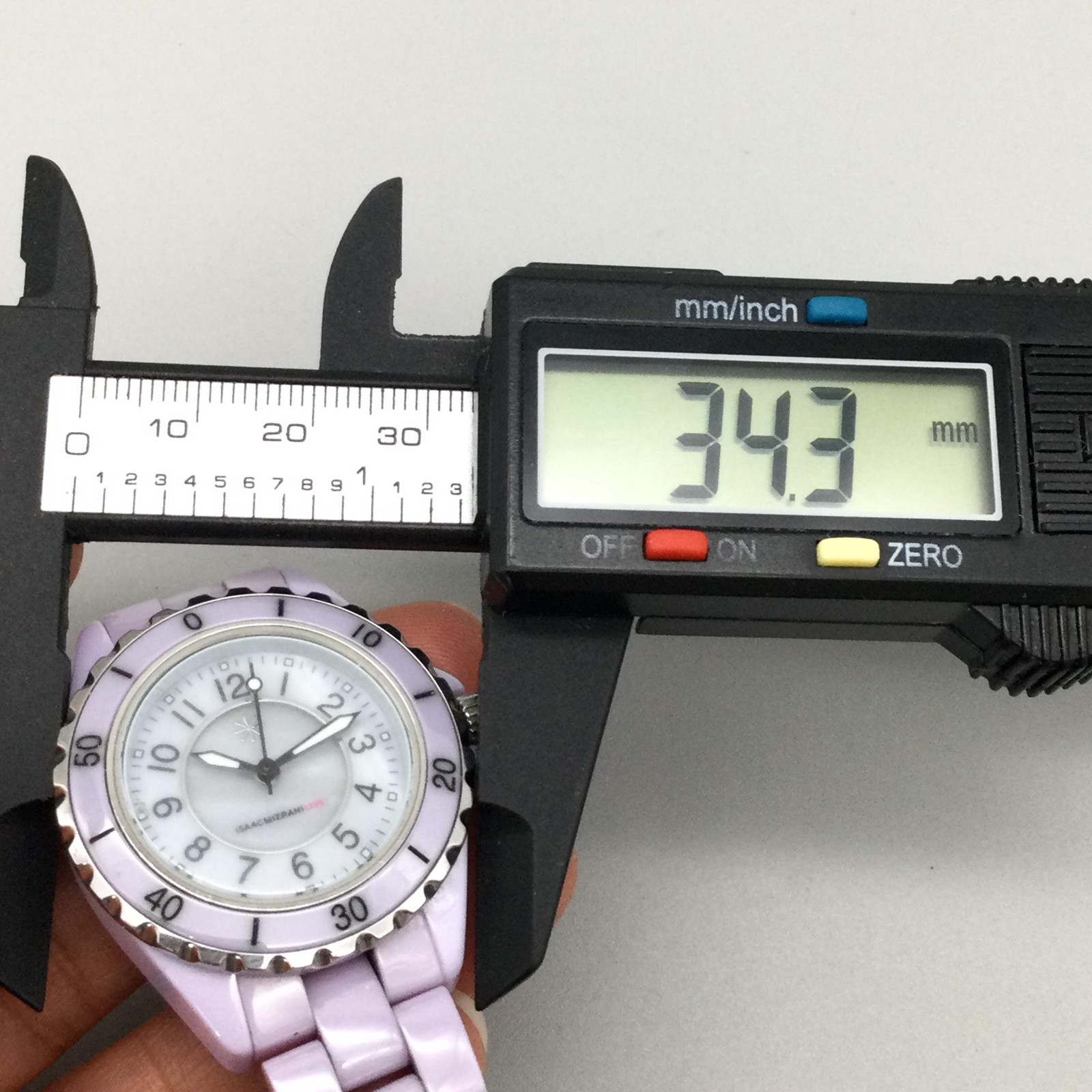 Isaac Mizrahi Live Womens Watch 34mm White MOP Purple Ceramic New Battery 6.5″