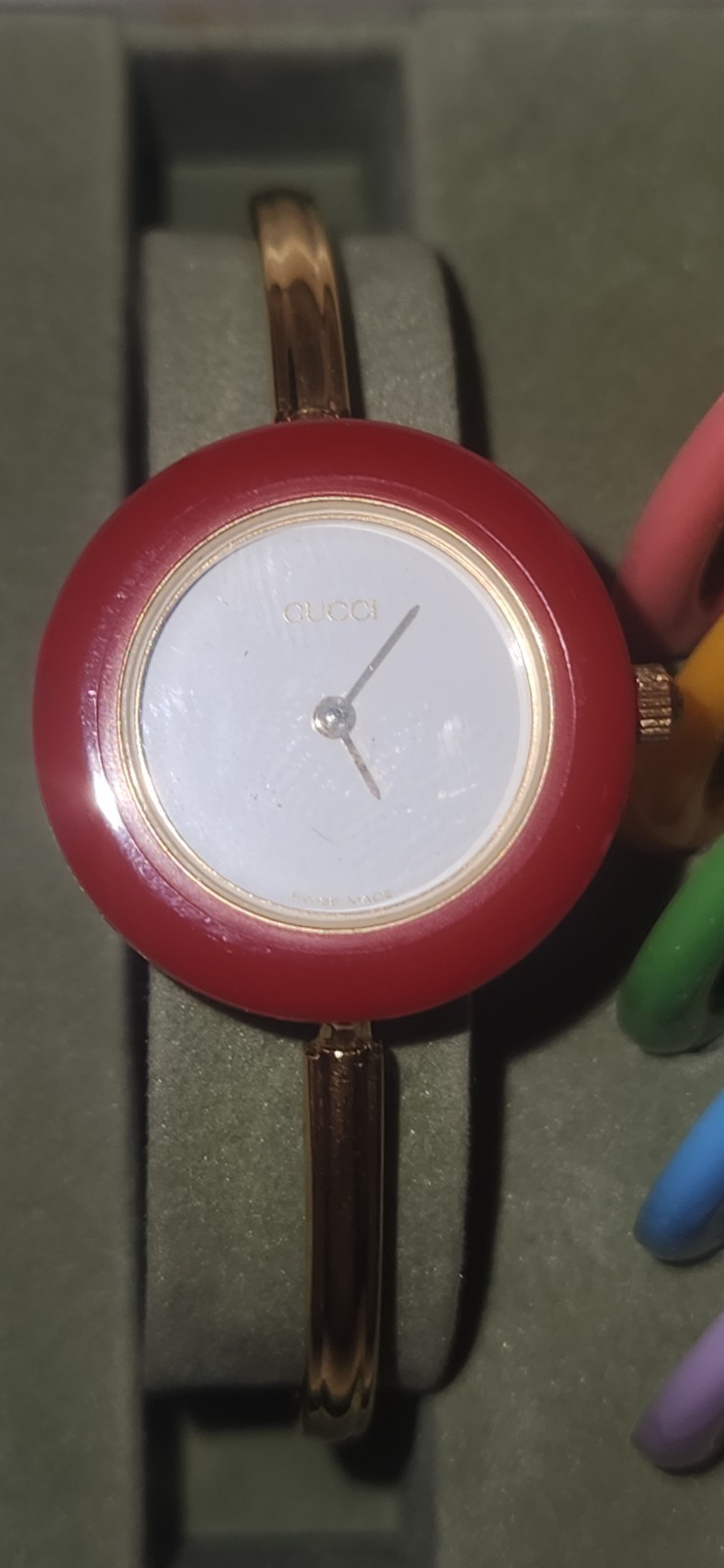Gucci 1100 Series Interchangeable Bezel Watch (referred to as the Gucci 11/12)
