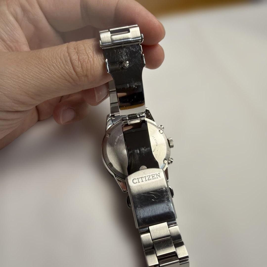 Citizen Eco-Drive E820 Solar Watch Silver Band Black Dial E820-S083460