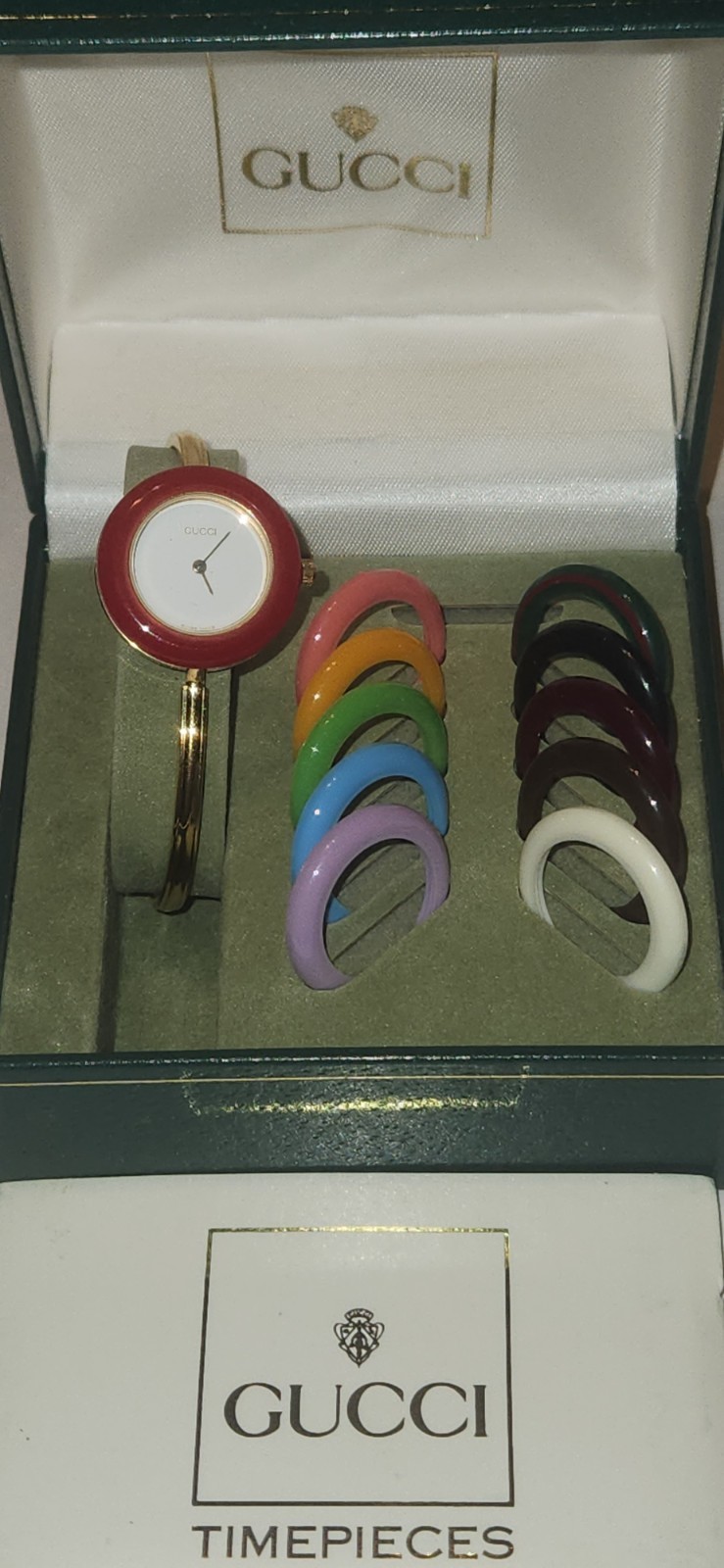Gucci 1100 Series Interchangeable Bezel Watch (referred to as the Gucci 11/12)
