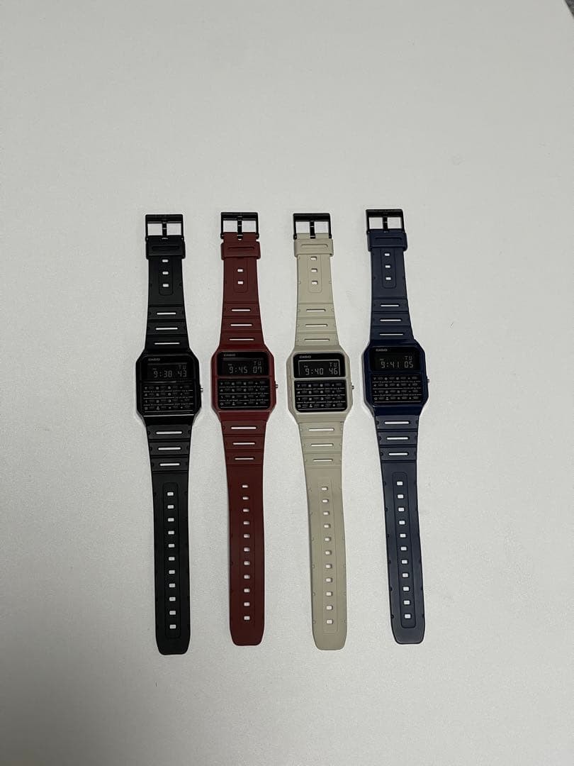 Casio CA-53W Digital Databank Watch 4 Color Set – Black, Red, White, Blue