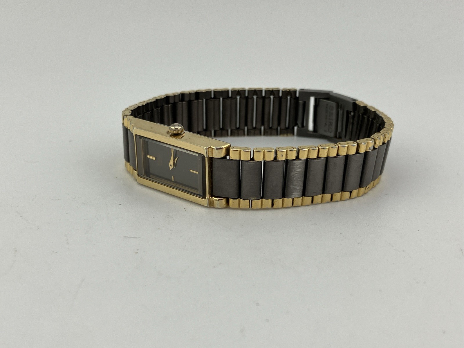 Vtg Seiko Ladies 12mm Watch Gray & Gold Tone Tank Dial 5.75″ 1e20-551h – RUNS