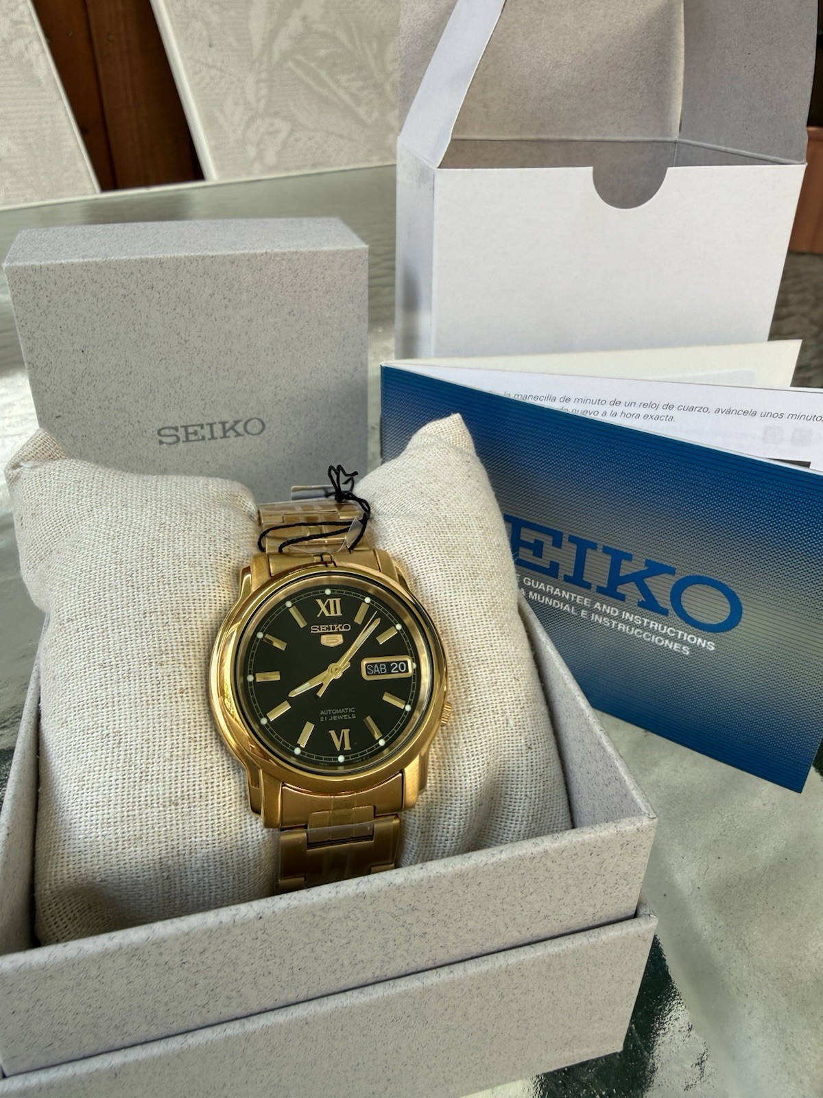 Seiko 5 Men’s Automatic Gold Tone Black Dial Exhibition Box Booklet