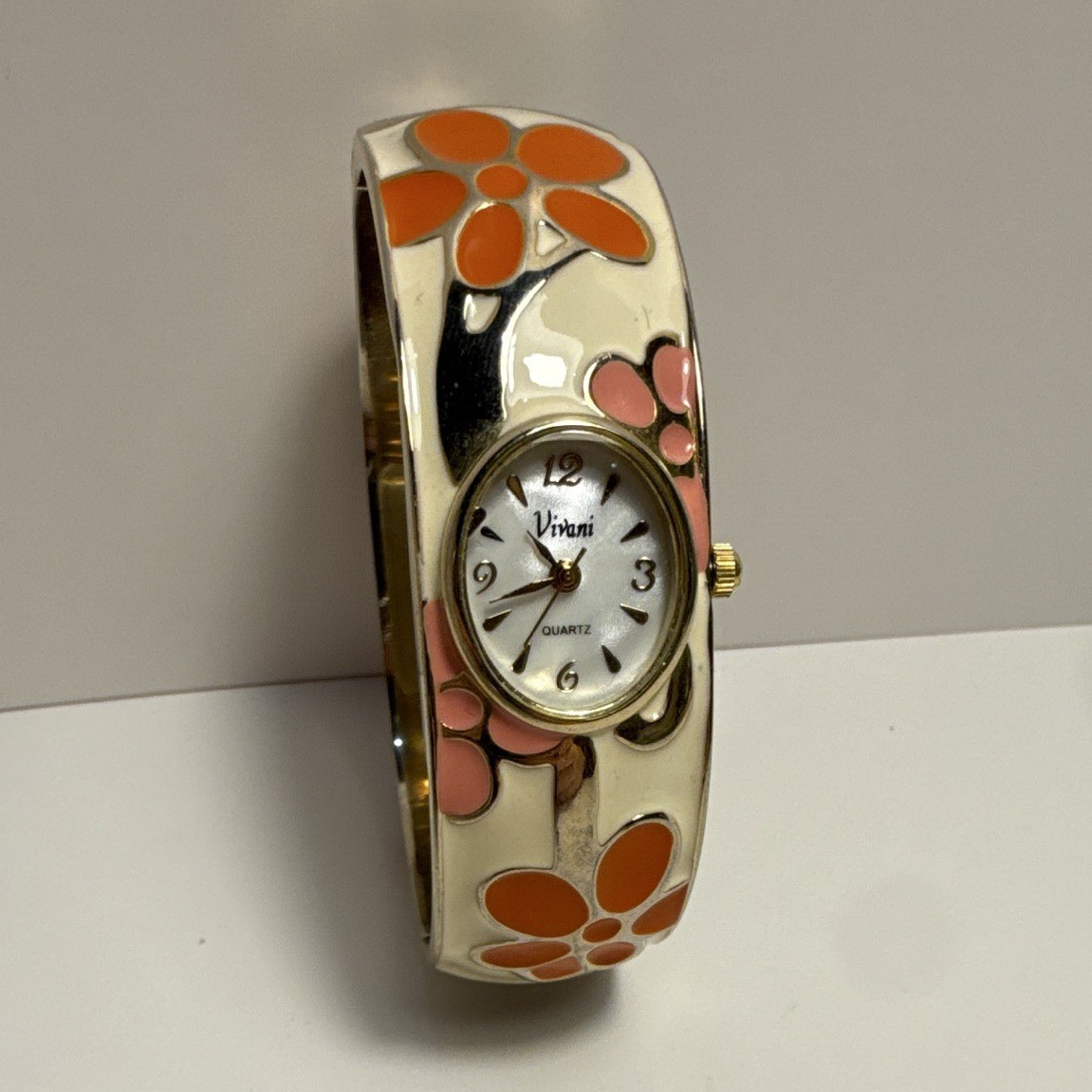 Vittini Women’s Quartz Analog White Dial Gold Bangle Floral Oval Watch