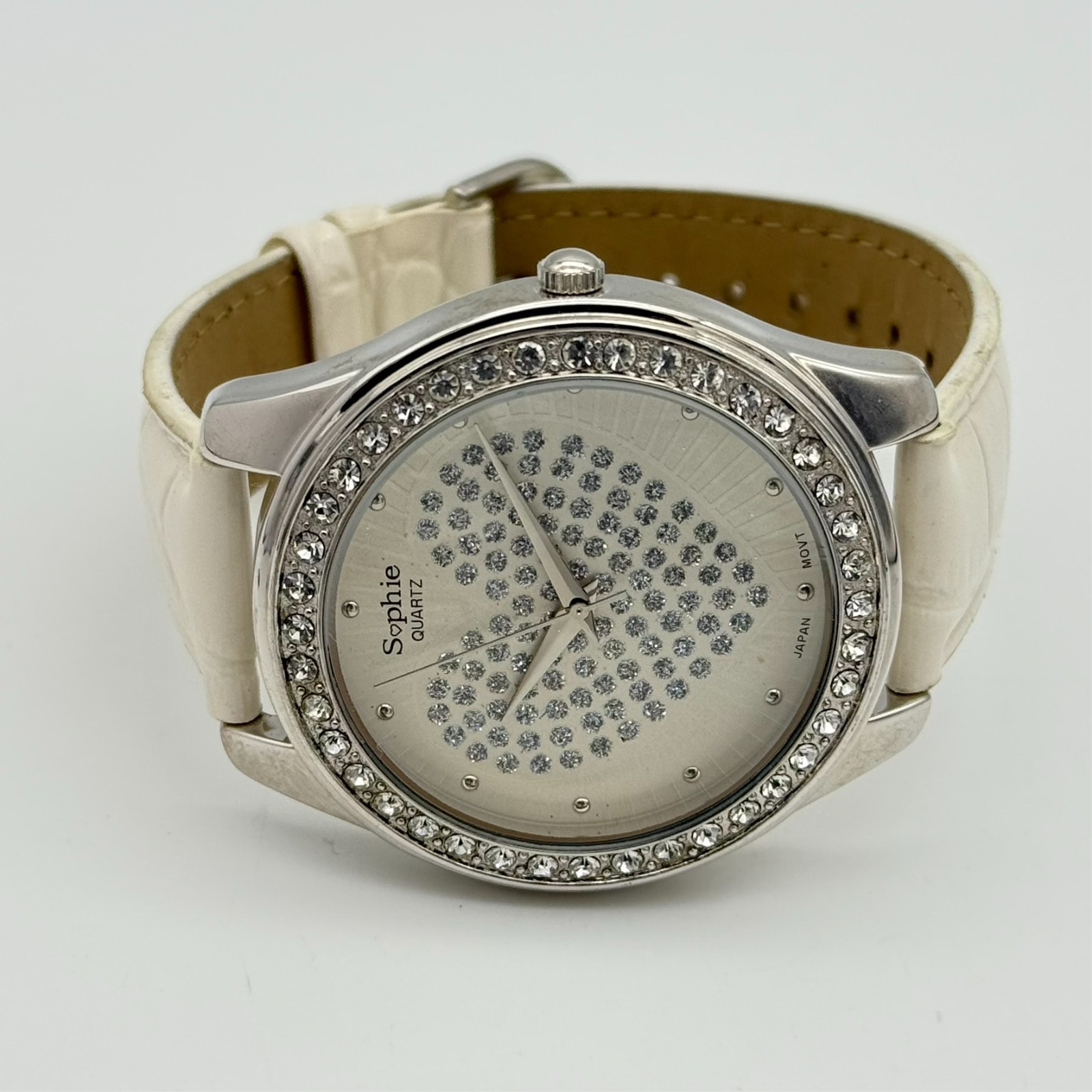 Women’s SOPHIE Silver Tone Crystal Heart Dial Watch, White Band, 45mm, Runs