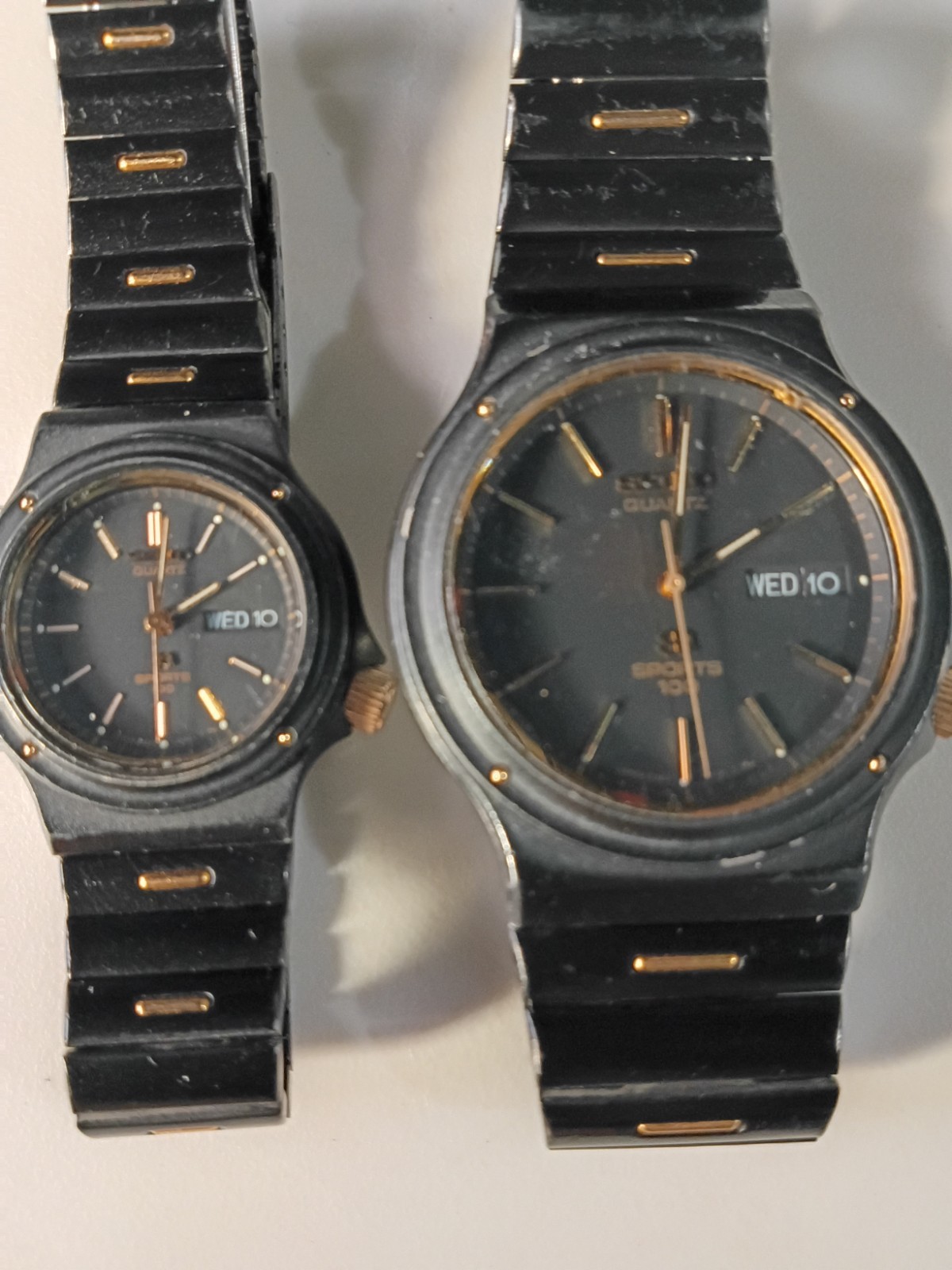 SEIKO SQ SPORTS 100 HIS HERS 1985 WATCH SET BLACK W/ GOLD ACCENTS RUNS GREAT