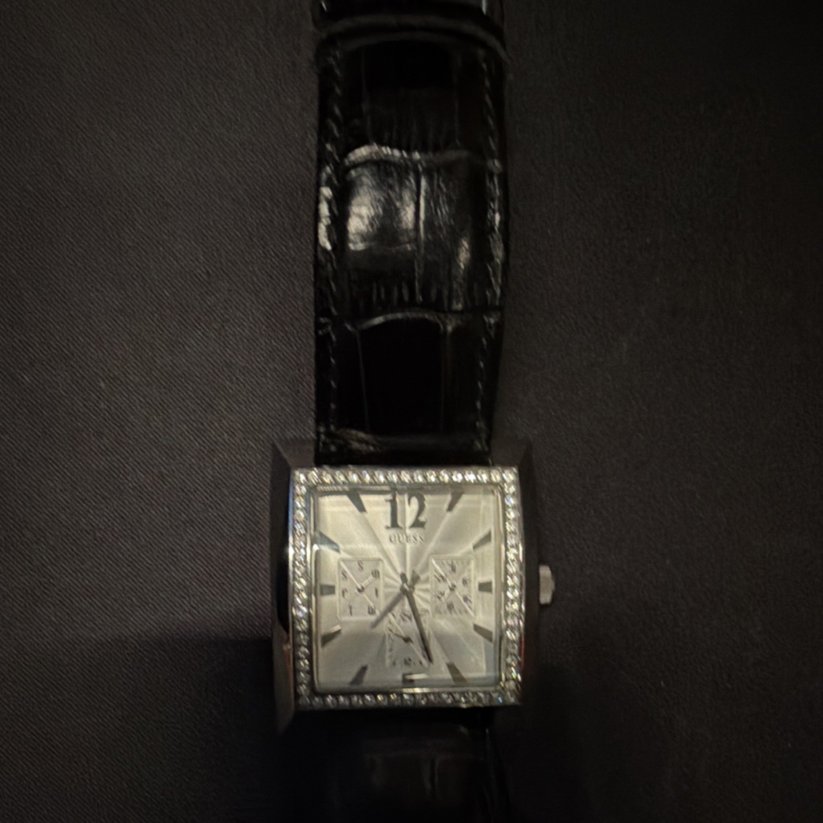 GUESS Timeless Beauty Women’s Quartz Square Silver Dial Black Leather Strap