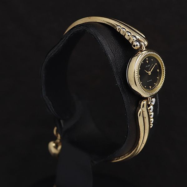 Alba Quartz Y150-0B30 Ladies Bangle Watch Gold-Tone Black Dial