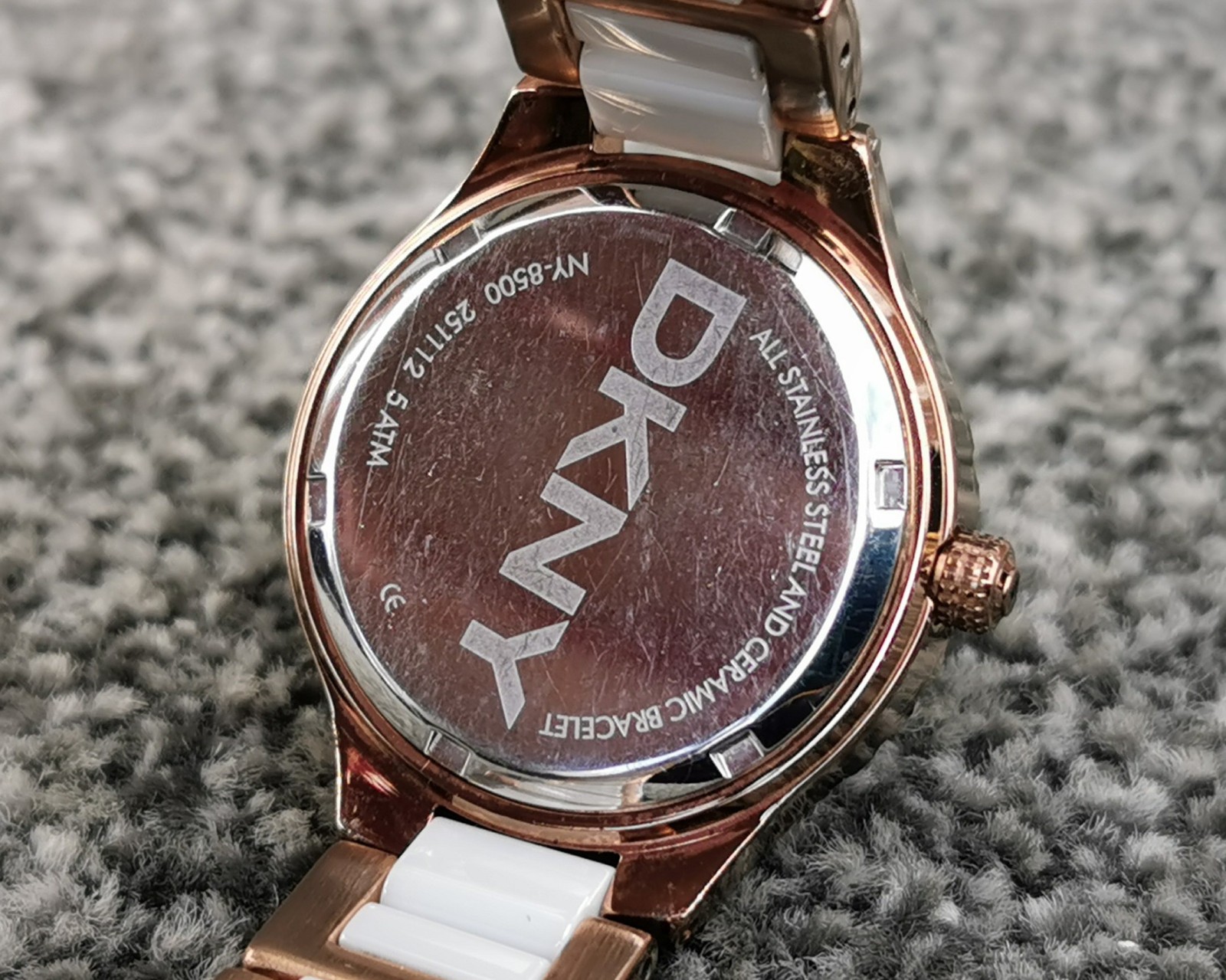 DKNY NY850 Rose Gold Watch, White Round Dial Ceramic Bracelet, Deployment Clasp