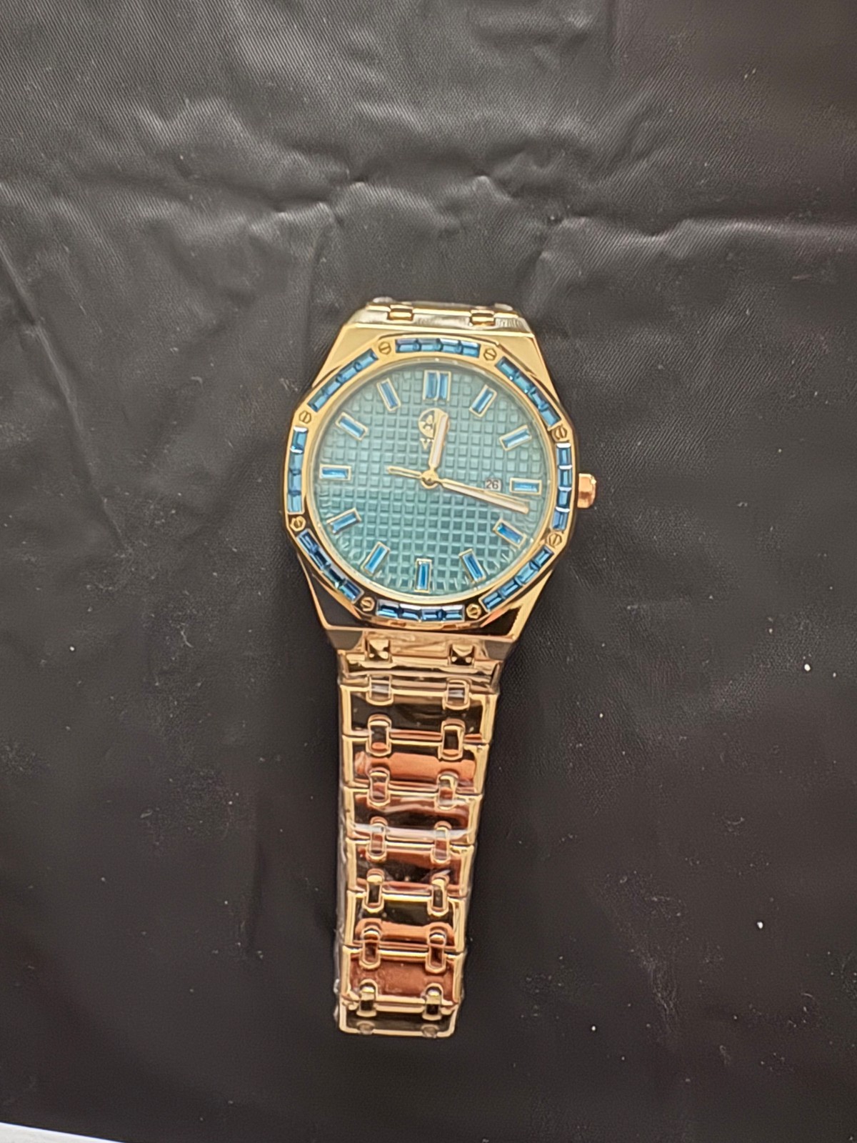 Gold on steel plate blue gem watch mens