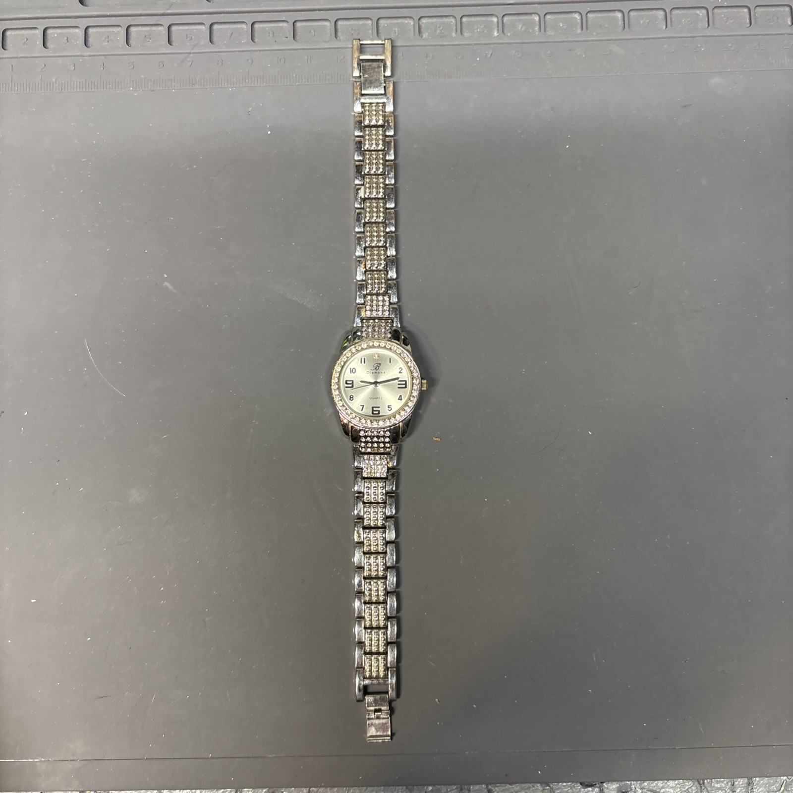 B Diamond Burgi Women’s Fashion Watch Silver Tone Faux Jewels BTV075 Needs Batt