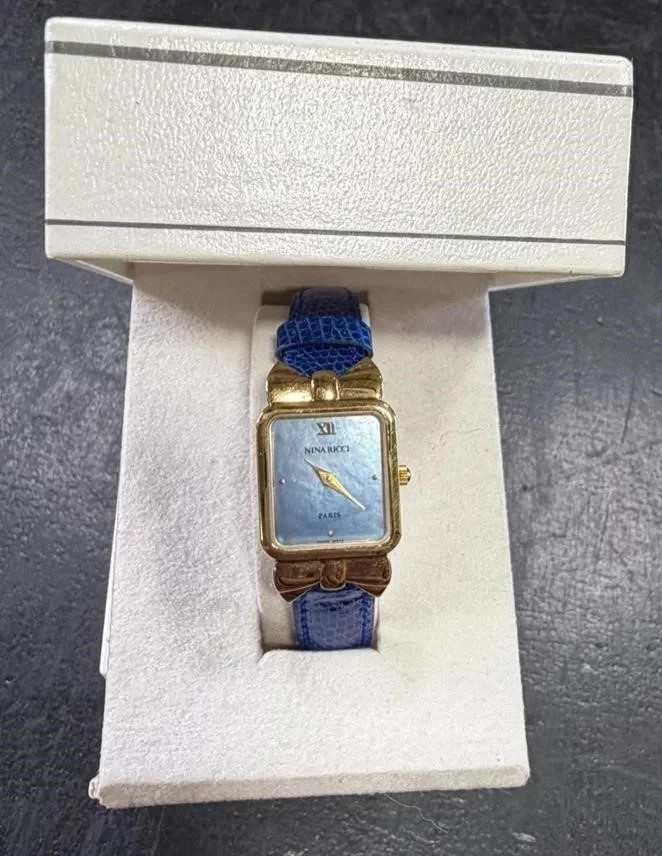 Vtg Nina Ricci Paris Ladies Watch Gold Bow Mother of Pearl Blue Dial Boxed Tank
