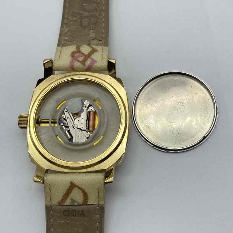 Dooney & Bourke Women’s Watch Gold Tone Crystal Bezel Heart Dial DB Logo Strap